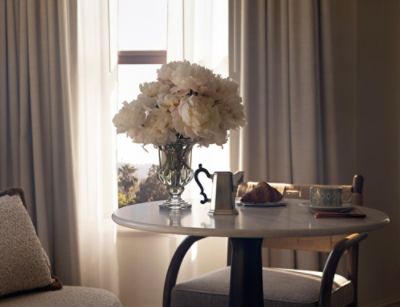 The Langham Huntington, Pasadena Royce Suite boasts a quiet location and an opulently-furnished bedroom.