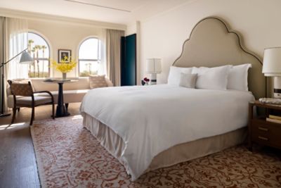 The Langham Huntington, Pasadena Deluxe Room features classic European-style furnishings and an Italian marble bathroom.