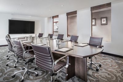 Spacious and ambient for executive board meetings and formal presentations