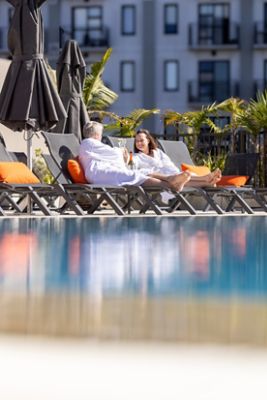 Relax on sun loungers and toast the sunset with your favourite snacks and cocktails during the summer months.