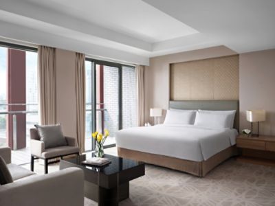 Cordis Foshan hotel room "Club Junior Suite" bedroom