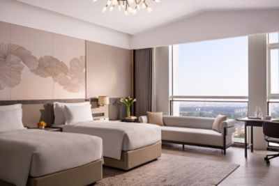 Cordis Kunshan bedroom of deluxe hotel room