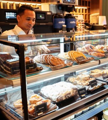 Man behind deli counter