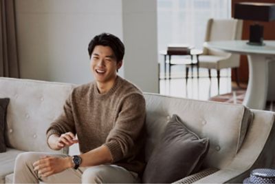 Steve Wang Shun sitting on sofa