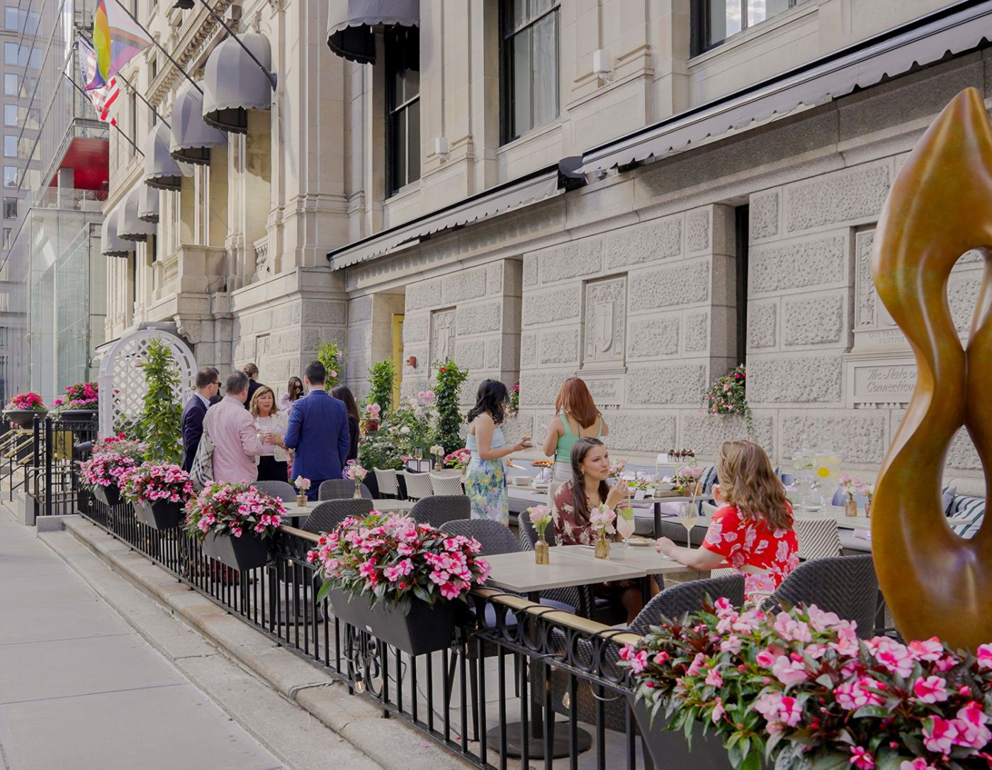 The garden terrace outside The Fed at The Langham, Boston in summer