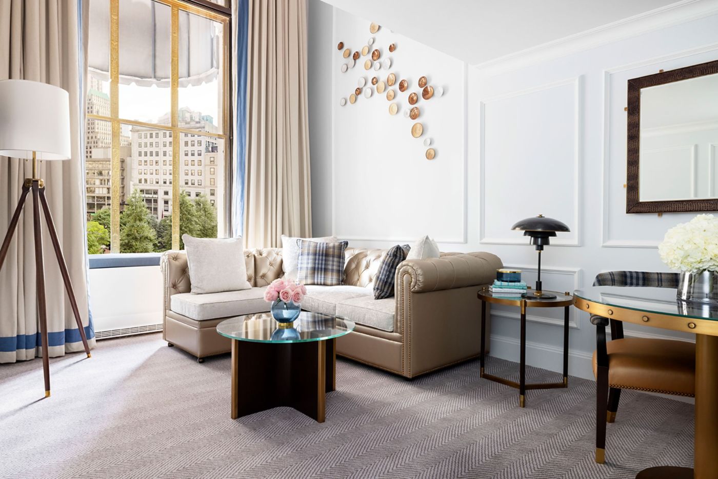 The double-height living room of a Loft Suite at The Langham, Boston