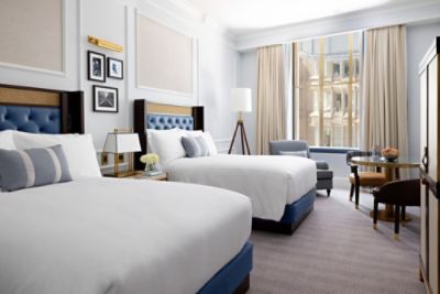 The Premier Room is a luxury retreat, with double beds - fit up to four guests. Enjoy panoramic views of Boston. 