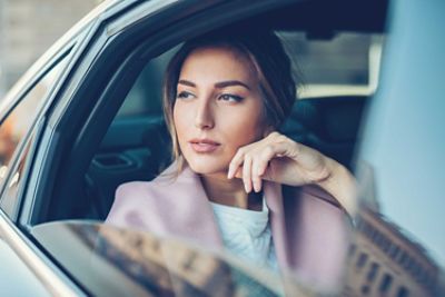 business woman in car