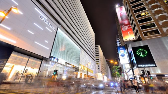 A view of Canton Road in Kowloon Hong Kong at night Stock Photo