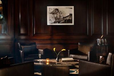 With dark wood paneling, deep crown molding and comfortable seating, The Tap Room is the ideal cocktail bar for a night out.