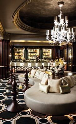 With dark wood paneling, deep crown molding and comfortable seating, The Tap Room is the ideal cocktail bar for a night out.