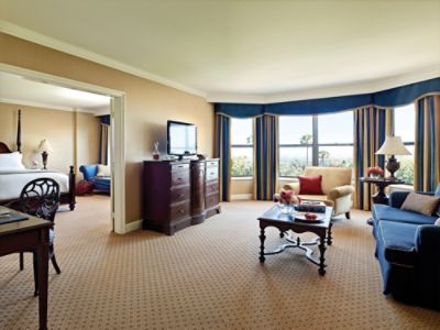 The Langham One-Bedroom Huntington Suite offers a spacious living area and a master bedroom with views of the hotel gardens.