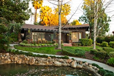 The Langham Huntington, Pasadena Wisteria California Cottage Suite offers a large master bedroom and separate living room along with shared patio.