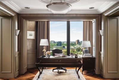 With an expansive living and office space, the Chairman Suite is ready for you to get some work done and relax.