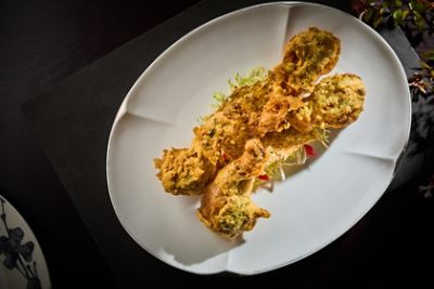 Deep-fried frog leg with, garlic and salty egg yolk