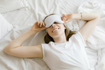 woman relaxing in bed